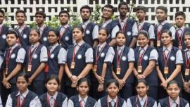 Students of Mount Carmel Convent Senior Secondary School at Cement Nagar in Chandrapur district of India's Maharashtra state pose for a photograph.